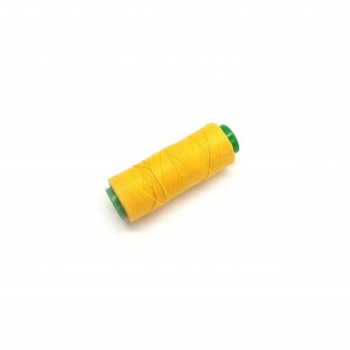 Waxed thread. Color - yellow. In pack for 100 meters.